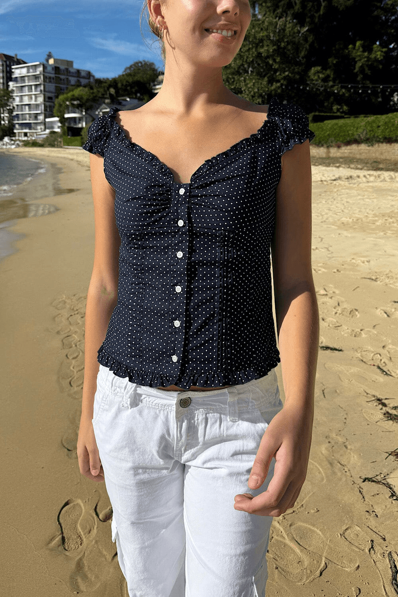 Brandy Melville Elena Atasan Polka Dot Biru Navy Pudar Dengan Polka Dot Putih